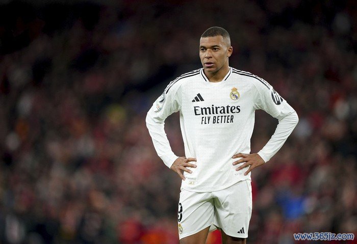 Real Madrids Kylian Mbappe stands on the pitch during the Champions League opening phase soccer match between Liverpool and Real Madrid at Anfield Stadium, Liverpool, England, Wednesday, Nov. 27, 2024. (Peter Byrne/PA via AP)